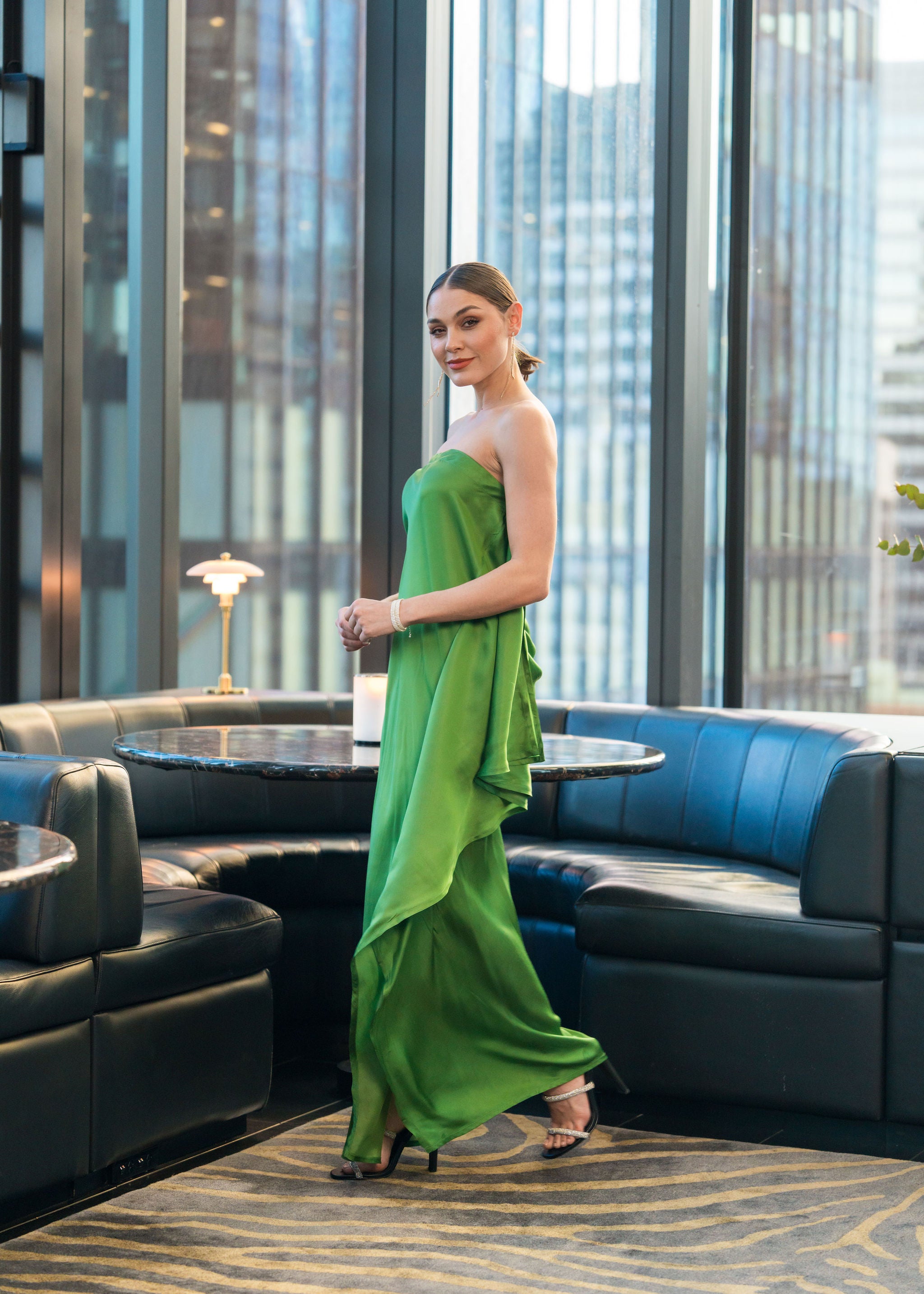 Strapless full length green dress with side scarf detail