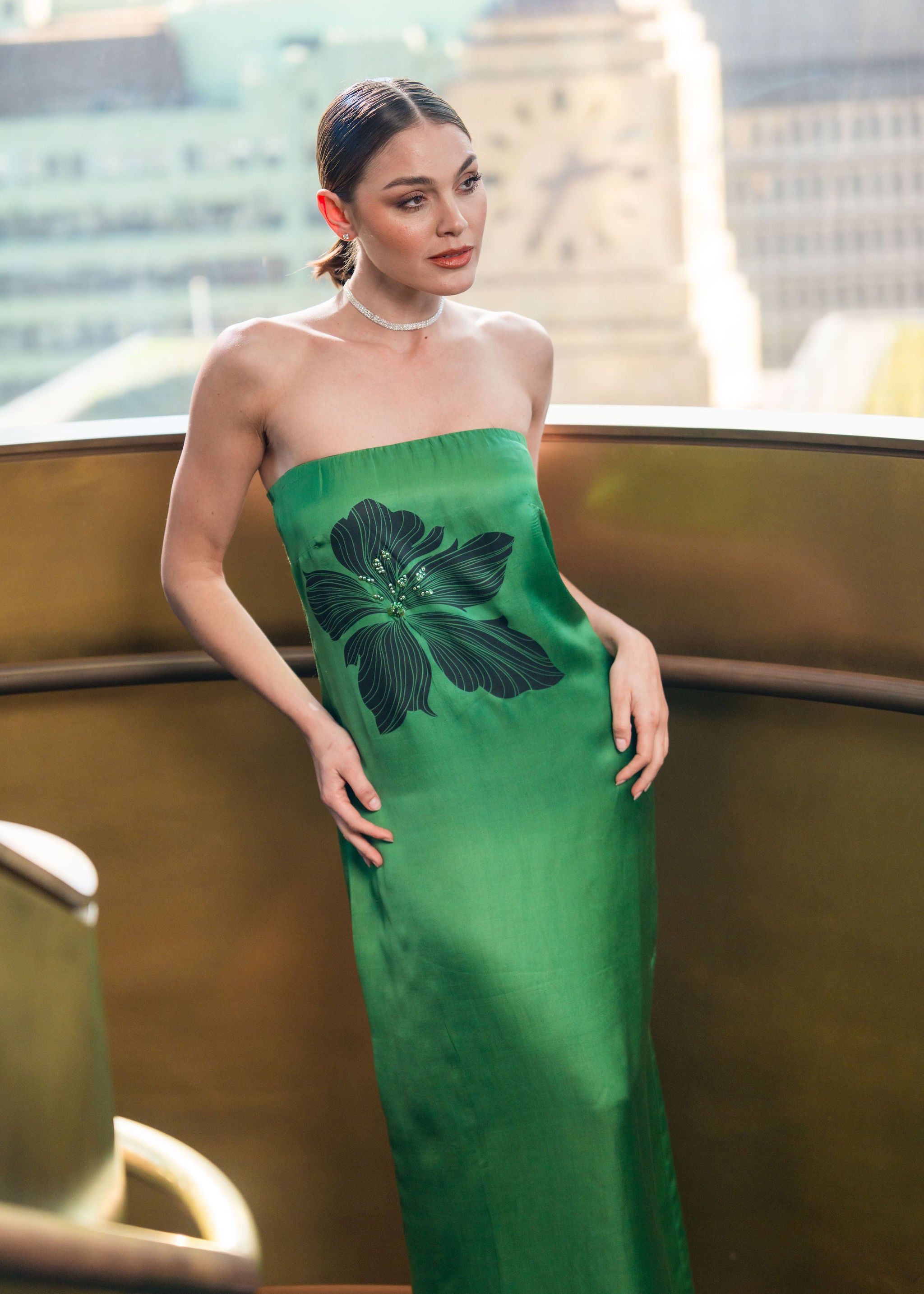 Green full length dress with floral print detail and hand embellishment