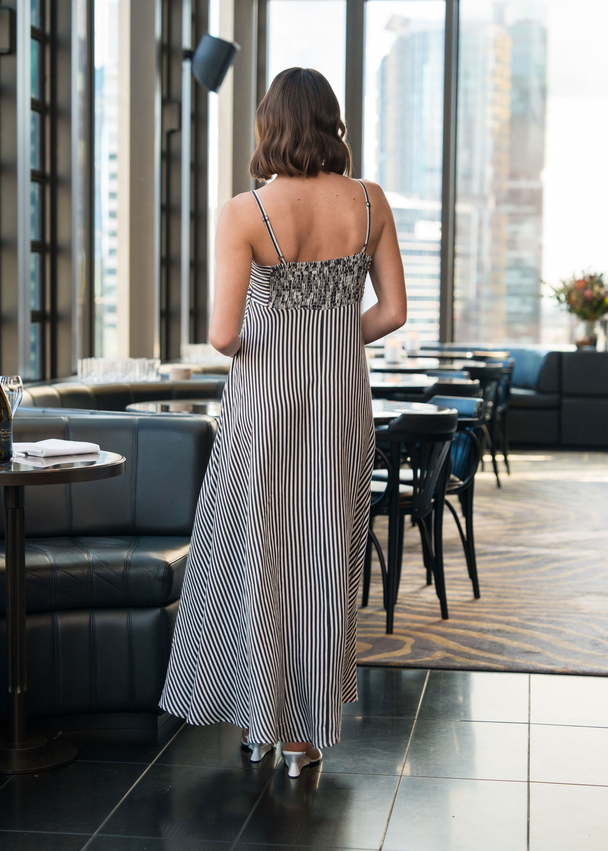 The Romilly sundress in a refined black and white stripe linen blend